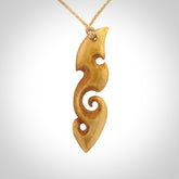This is a wonderful, contemporary large koru from stained bone. Hand carved and provided with an adjustable oat cord.