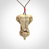 This is a triple elephant pendant, carved in a Deer Antler. The cord is length adjustable. Provided in a woven kete pouch and delivered with express courier.