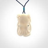 This is a beautiful little hand carved octopus pendant. It is a very cute little pendant that we have carved in natural, untreated bone. We provide these with adjustable cords and shipping is included worldwide.