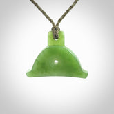 Hand carved New Zealand jade dog whistle. Carved for NZ Pacific by master carver Ross Crump. Jade dog whistle pendant provided with adjustable cord and delivered with express courier.