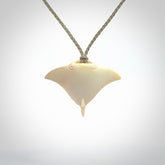 Woolly mammoth tusk manta ray pendant. Hand carved Mammoth Tusk manta ray pendant. Provided with adjustable cord.