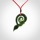 Whale tail pendant beautifully Hand Carved in New Zealand Pounamu