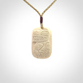 Hand carved woolly mammoth tusk pendant