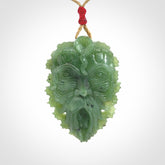 This picture shows a large hand carved forest man face pendant. The cord is hand plaited and adjustable.
