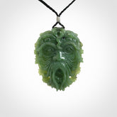 Hand carved forest man pendant in Jade
