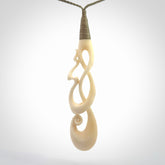 A wonderful, intricate pendant handcarved by Yuri in bone. A beautifully sensual and fascinating form that reflects the complexity and wonder of human relationships.