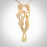 This pendant is a gorgeous and intricately carved mermaid and merman pendant. Carved by renowned bone carver Yuri Terenyi for us, this is a little masterpiece. The craftsmanship displayed in this piece is extraordinary - a collectors item, or a piece to wear and love.
