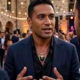 Man wearing NZ Pacific Silver and Jade Mountain Heart pendant