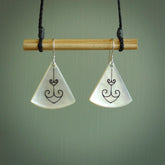 Hand carved New Zealand mother of pearl drop, Koru earrings hand made by Kerry and Amanda Thompson. One only large Koru earrings. Real New Zealand Mother of Pearl art to wear. Free Shipping worldwide.