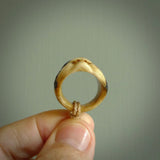 Hand carved Otafuku face ring. Made from Red Deer antler in New Zealand. Unique Otafuku ring hand made from deer antler by master bone carver Fumio Noguchi. Spectacular collectable work of art, made to wear. One only ring, delivered to you at no extra cost with express courier.