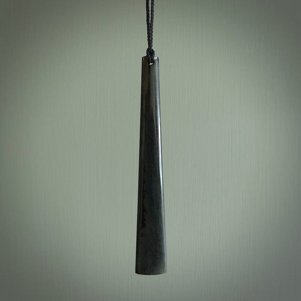 A hand carved large Black Jade drop, roimata, necklace. The cord is a black colour and is a fixed length. A large sized hand made drop necklace by New Zealand artist Kerry Thompson. One off work of art to wear.