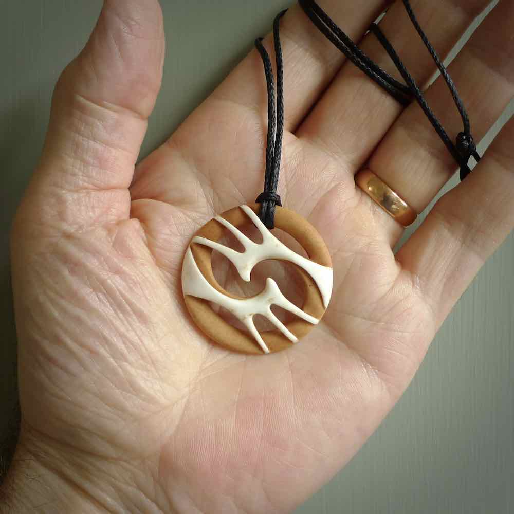 Hand carved deals wood pendants