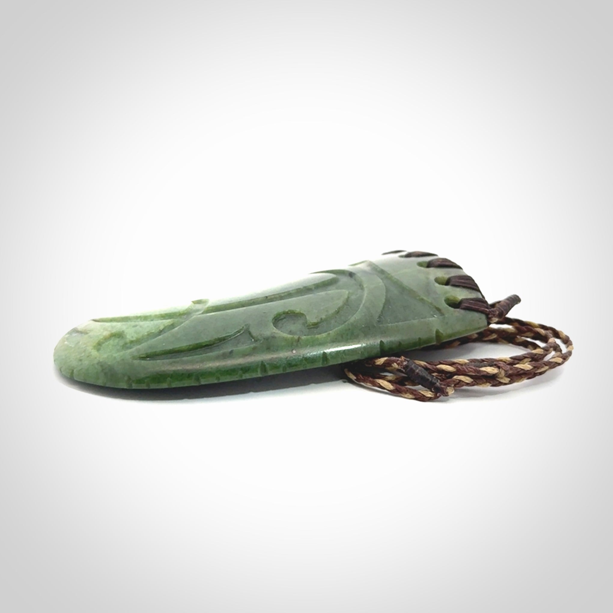Large Jade Niho with Koru pendant. Hand carved from a lovely piece of local New Zealand Jade.