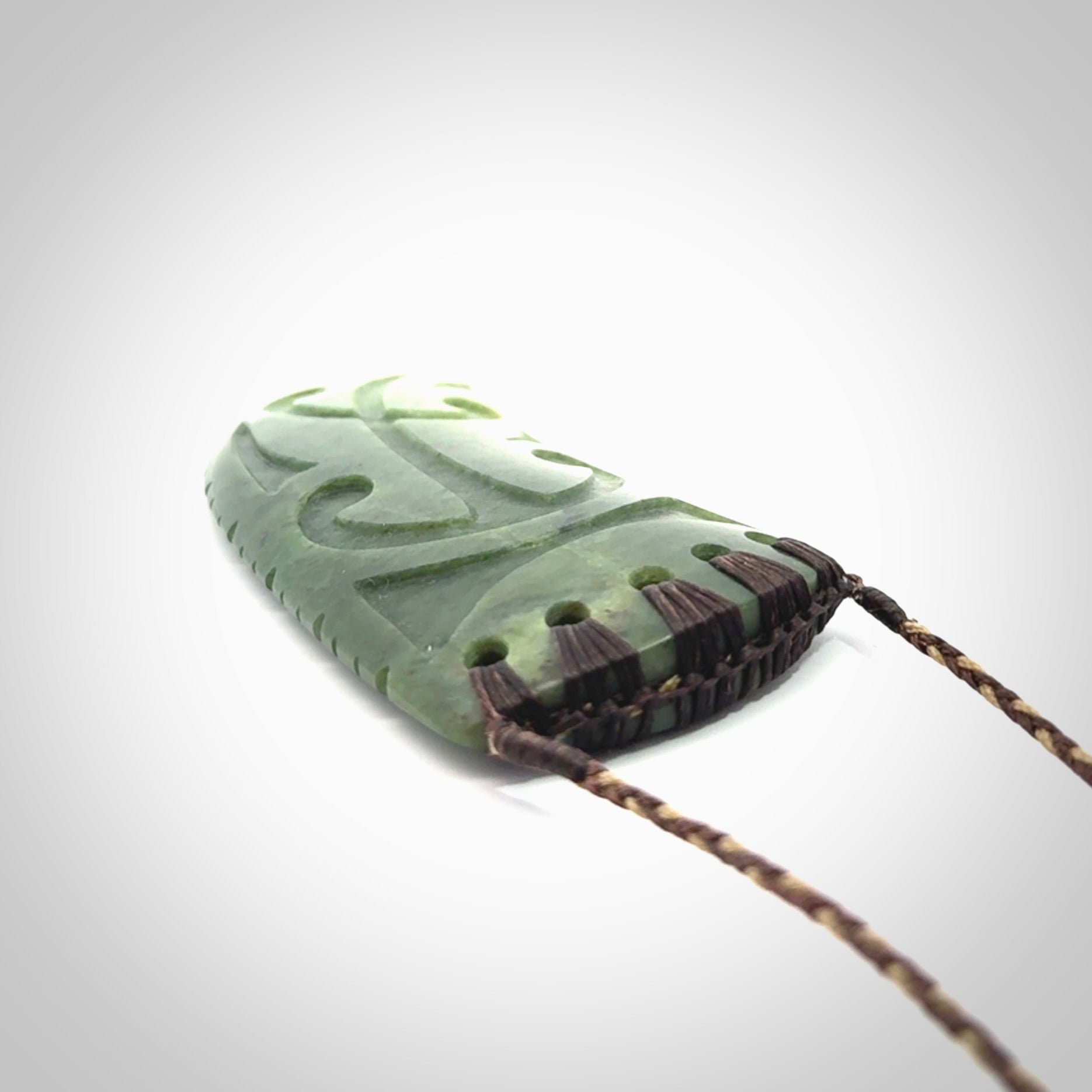Large Jade Niho with Koru pendant. Hand carved from a lovely piece of local New Zealand Jade.