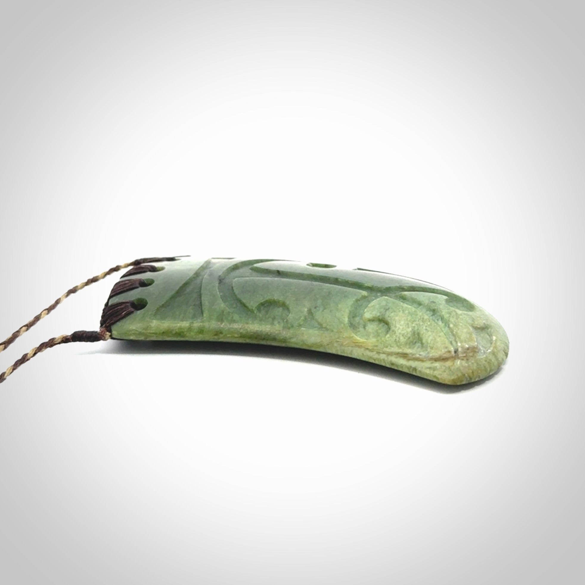 Large Jade Niho with Koru pendant. Hand carved from a lovely piece of local New Zealand Jade.