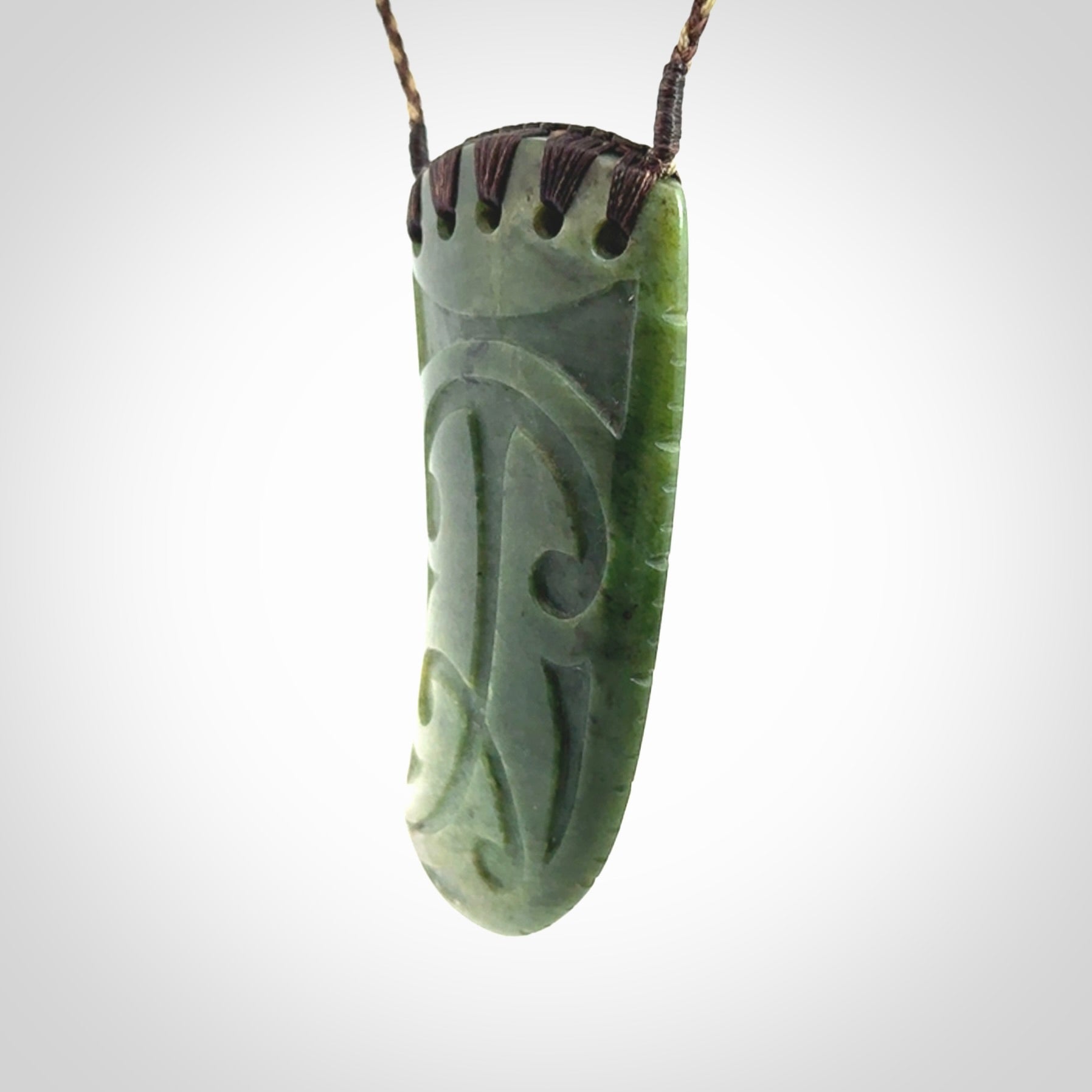 Large Jade Niho with Koru pendant. Hand carved from a lovely piece of local New Zealand Jade.