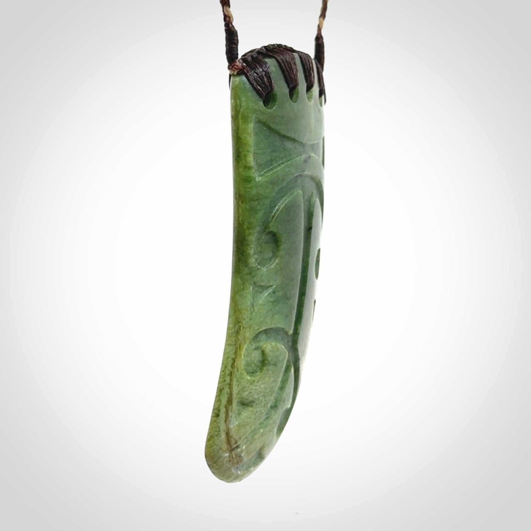 Large Jade Niho with Koru pendant. Hand carved from a lovely piece of local New Zealand Jade.