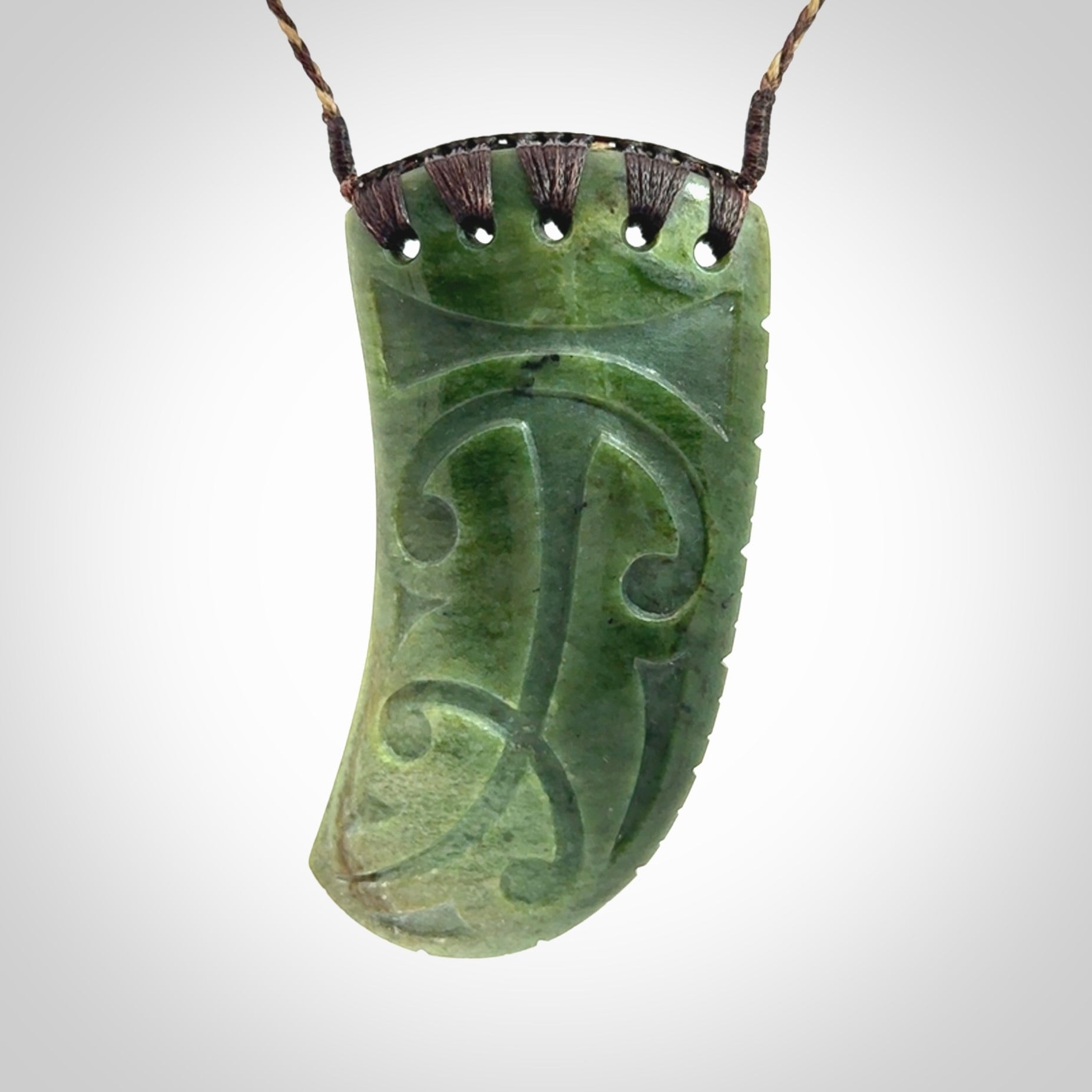 Large Jade Niho with Koru pendant. Hand carved from a lovely piece of local New Zealand Jade.