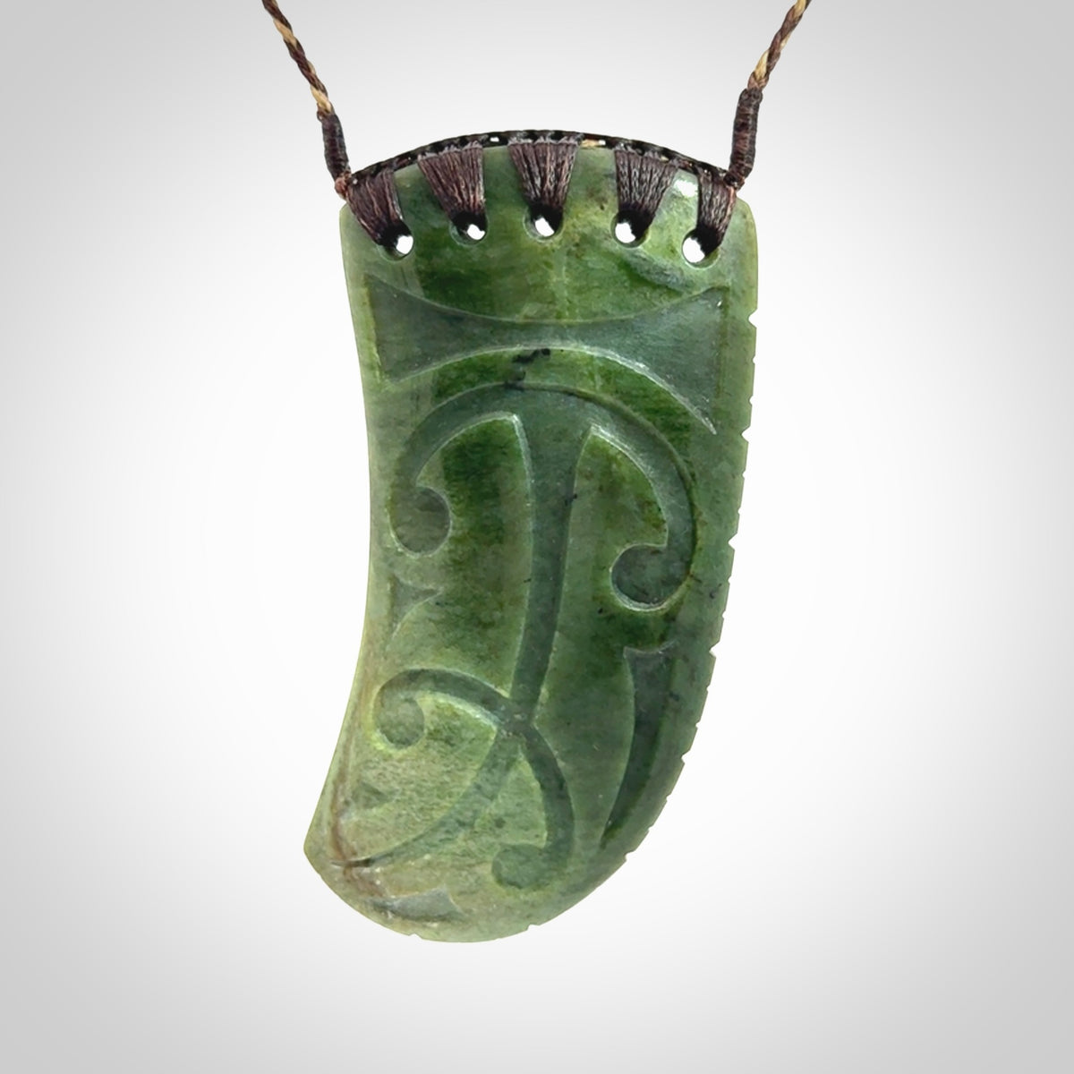 Large Jade Niho with Koru pendant. Hand carved from a lovely piece of local New Zealand Jade.