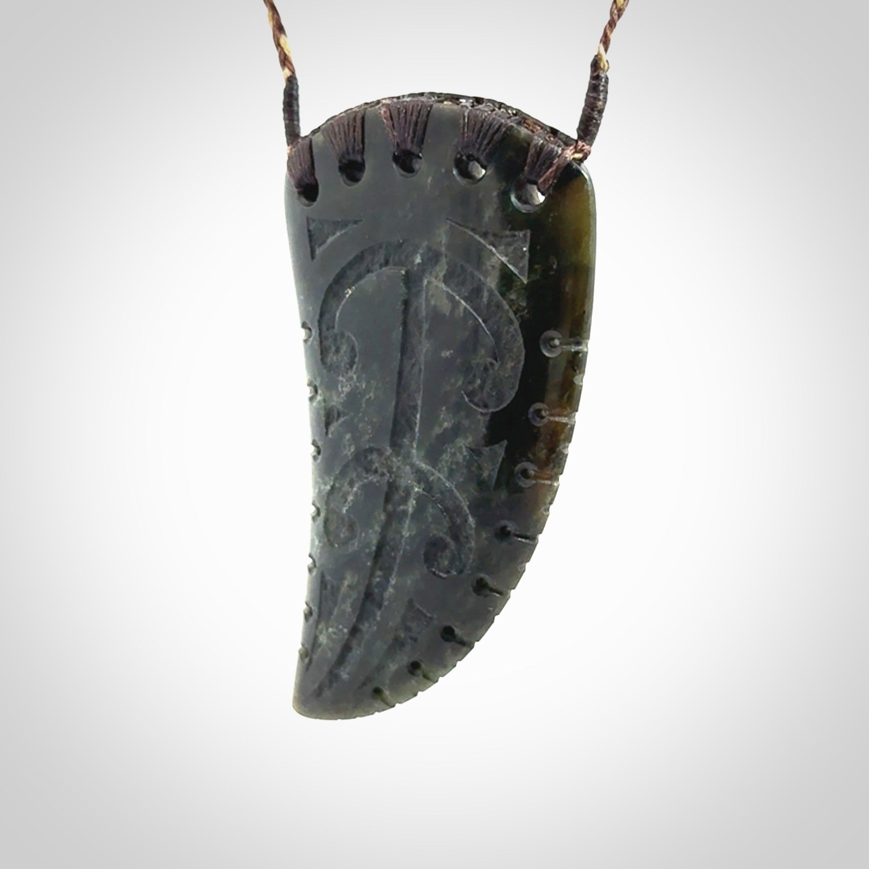 Large Jade Niho with Koru pendant. Hand carved from a lovely piece of local New Zealand Jade.