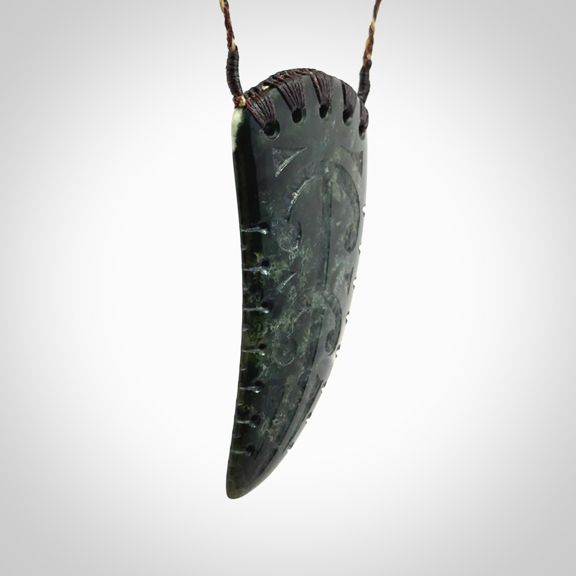 Large Jade Niho with Koru pendant. Hand carved from a lovely piece of local New Zealand Jade.