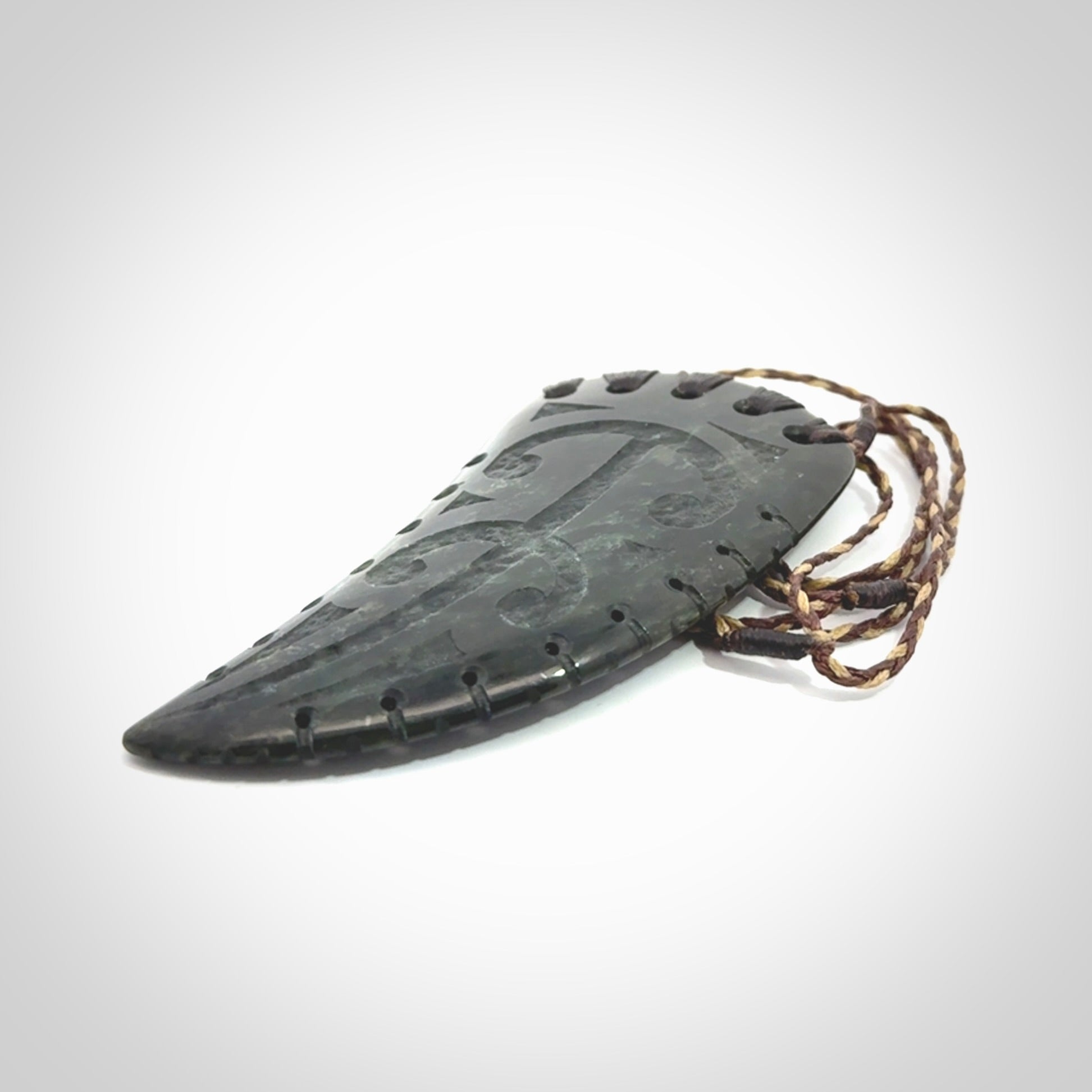 Large Jade Niho with Koru pendant. Hand carved from a lovely piece of local New Zealand Jade.