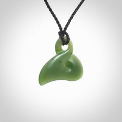 Hand carved smaller sized, New Zealand jade twist pendant. Carved in New Zealand by NZ Pacific.