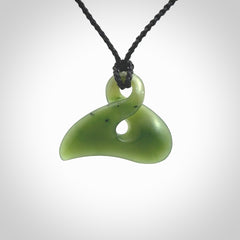 Hand carved smaller sized, New Zealand jade twist pendant. Carved in New Zealand by NZ Pacific.