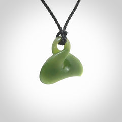 Hand carved smaller sized, New Zealand jade twist pendant. Carved in New Zealand by NZ Pacific.