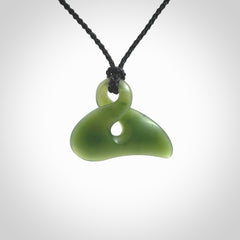 Hand carved smaller sized, New Zealand jade twist pendant. Carved in New Zealand by NZ Pacific.