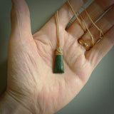 Hand carved jade toki by Ric Moor. Made in New Zealand by NZ Pacific. Hand carved Toki pendants crafted from beautiful New Zealand Pounamu, Jade. We deliver these with Express Courier, on adjustable cords.