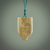 Hand carved Wheku pendant. Carved from deer antler by NZ Pacific. Hand crafted bone jewellery for sale online.