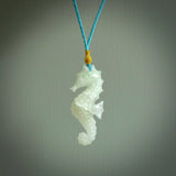 A hand carved Jadeite seahorse pendant. We have carved this from beautiful jadeite and we bind them with our hand-plaited cords. The cords are a waxed polyester so they are durable and strong. We ship these worldwide with express courier anywhere in the world.