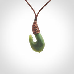Small New Zealand jade hei-matau, hook, pendant.