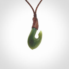 Small New Zealand jade hei-matau, hook, pendant.