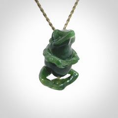Hand carved frog pendant. Carved in British Columbian jade by NZ Pacific.