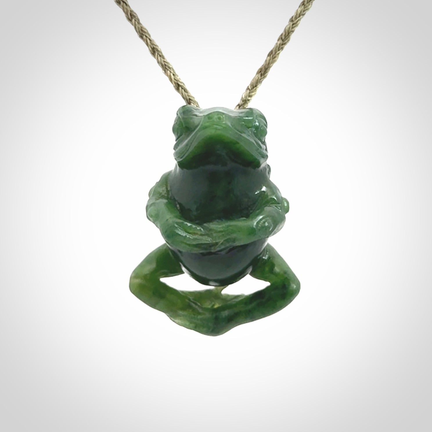 Hand carved frog pendant. Carved in British Columbian jade by NZ Pacific.