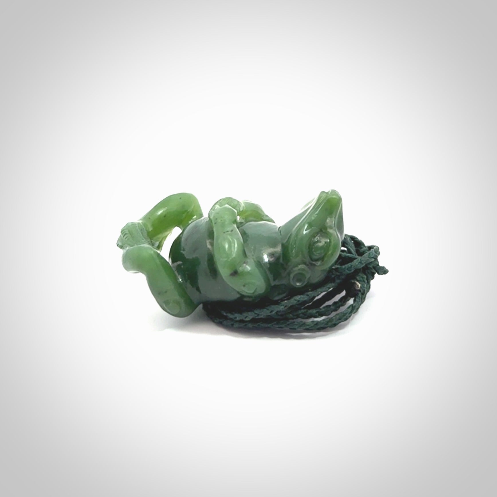 Hand carved frog pendant. Carved in British Columbian jade by NZ Pacific.