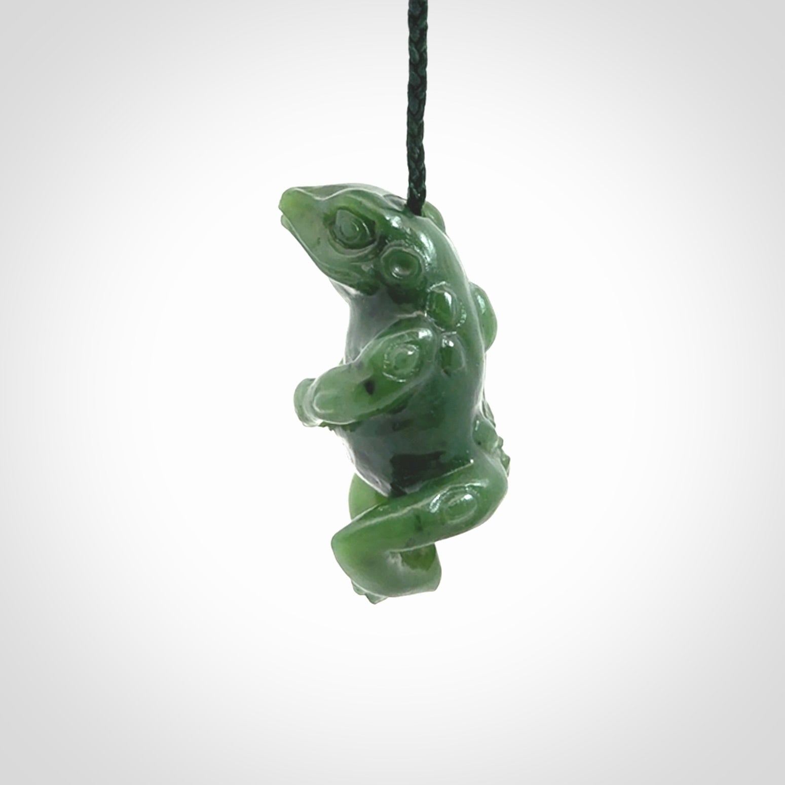 Hand carved frog pendant. Carved in British Columbian jade by NZ Pacific.