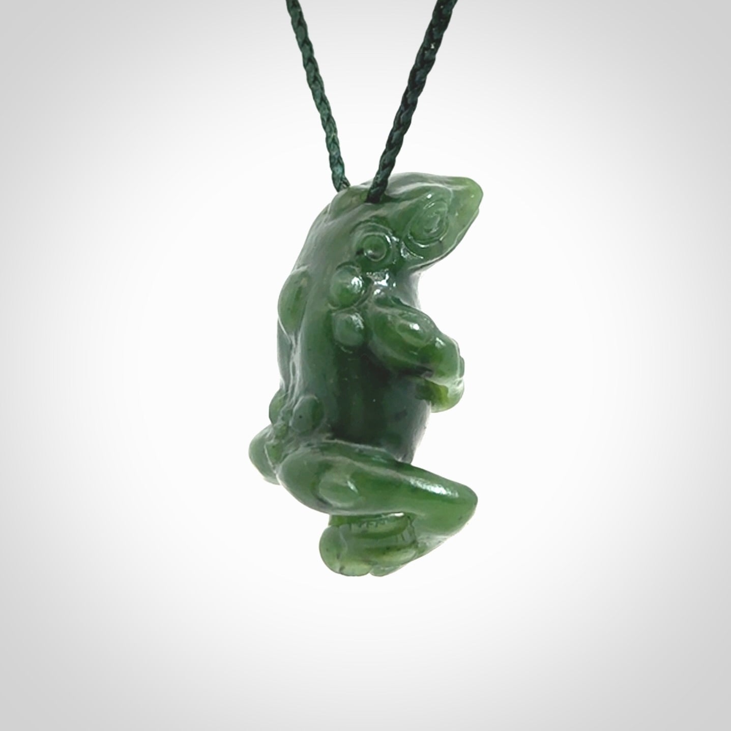 Hand carved frog pendant. Carved in British Columbian jade by NZ Pacific.