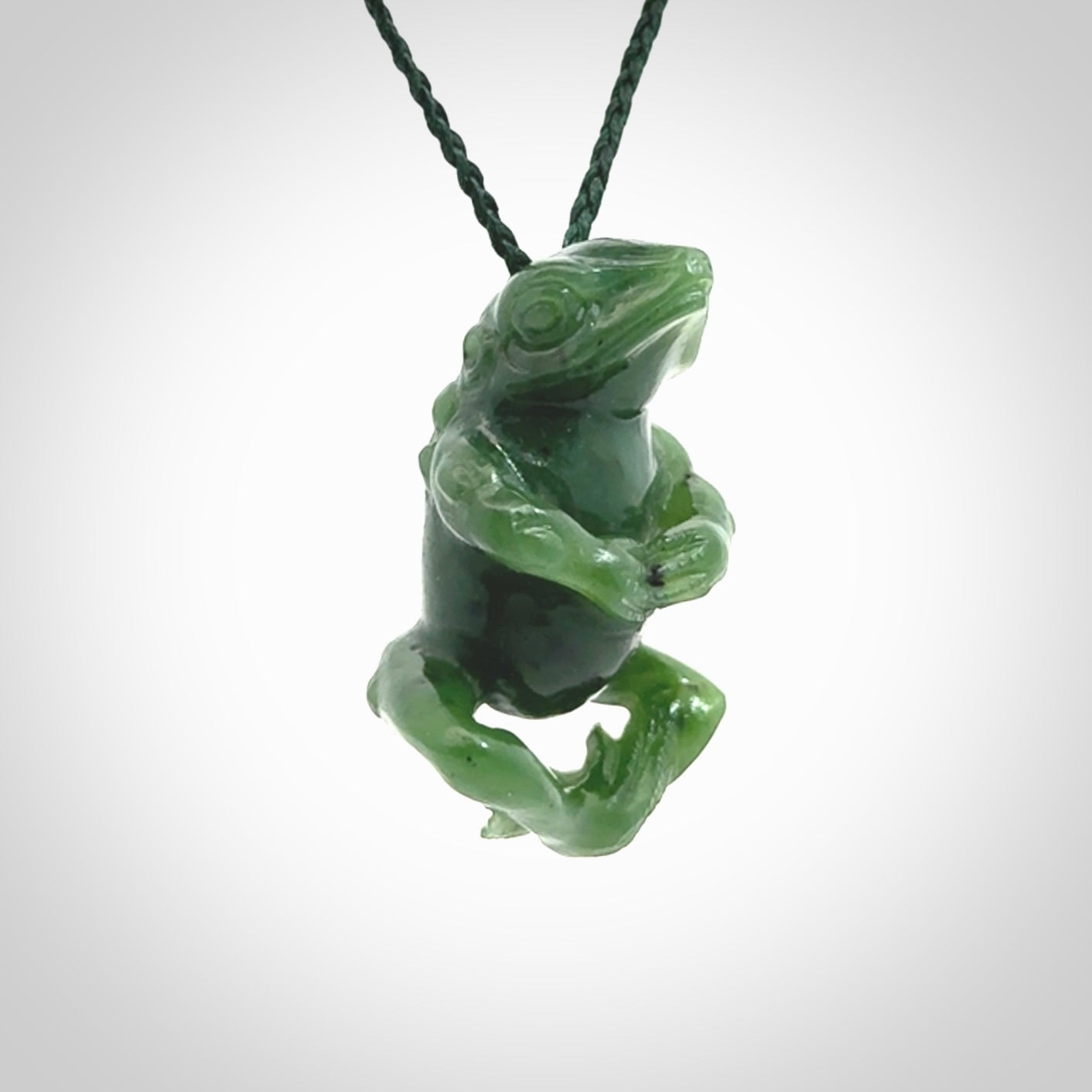 Hand carved frog pendant. Carved in British Columbian jade by NZ Pacific.