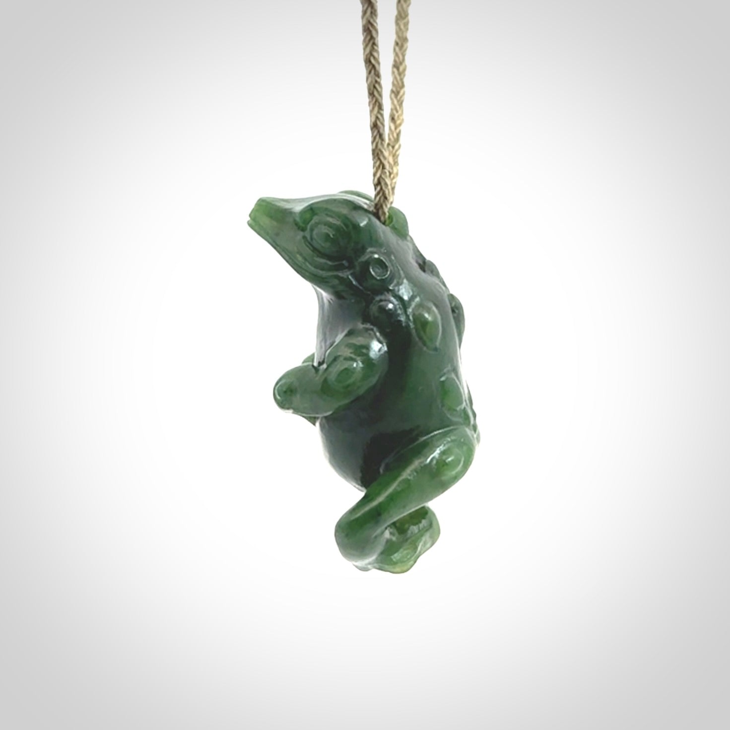Hand carved frog pendant. Carved in British Columbian jade by NZ Pacific.