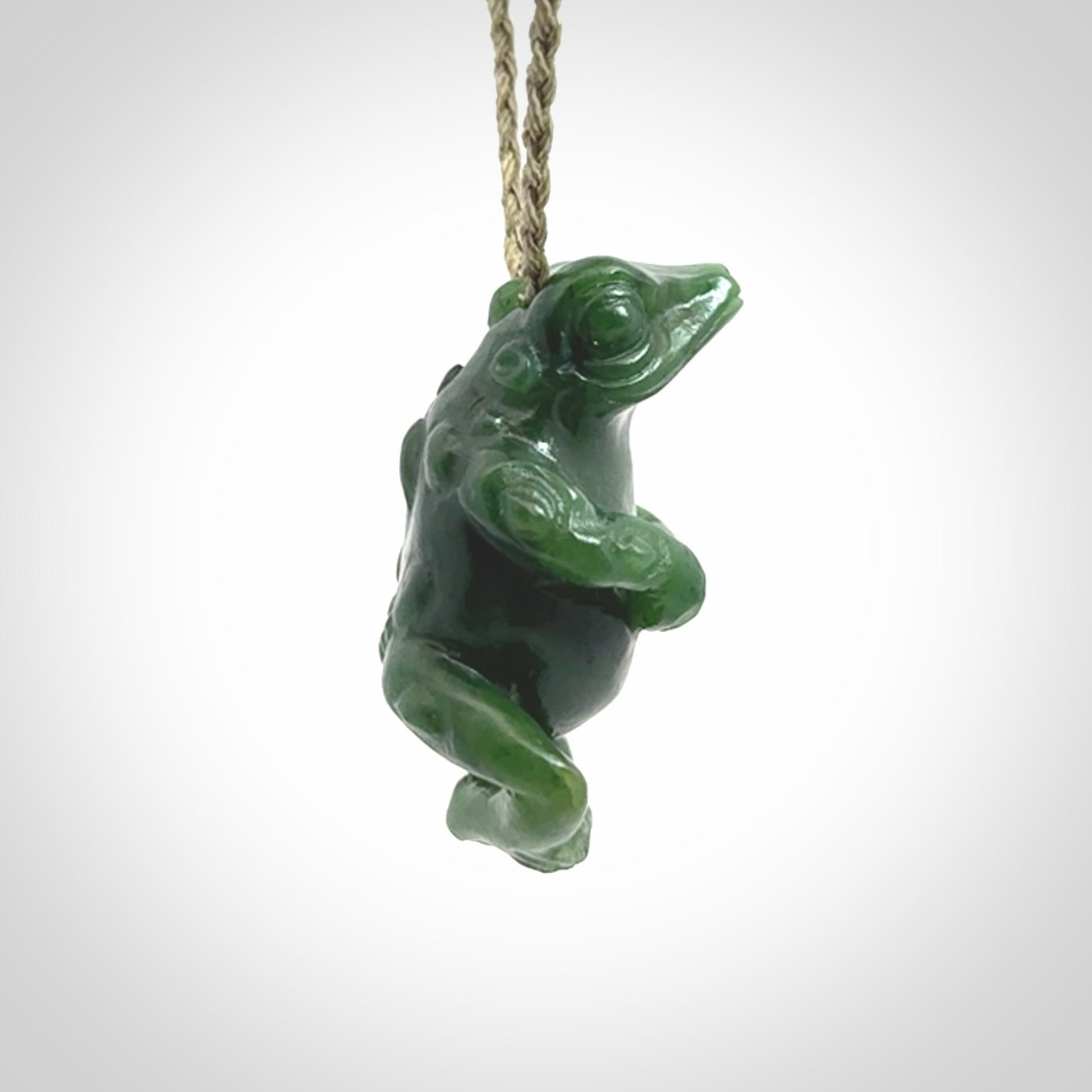 Hand carved frog pendant. Carved in British Columbian jade by NZ Pacific.