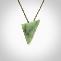 This is a lovely New Zealand Jade, pounamu niho drop pendant. It is bound with an adjustable khaki coloured cord which is length adjustable.