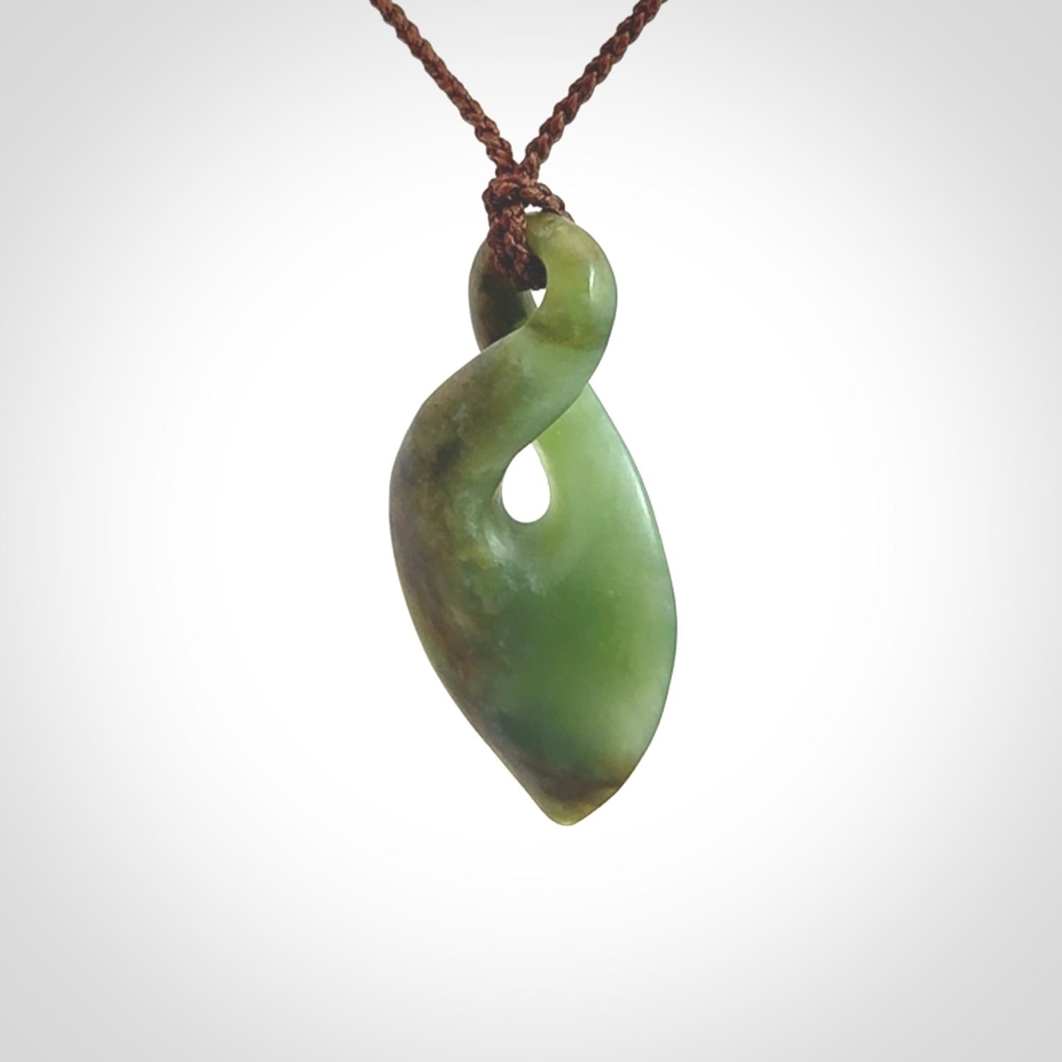 Hand carved New Zealand flower jade, twist pendant.