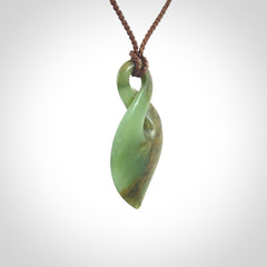 Hand carved New Zealand flower jade, twist pendant.