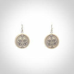 Hand carved round bone koru earrings with double sided engraving.