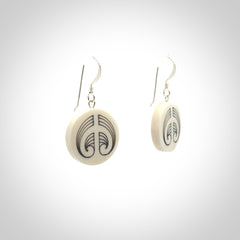 Hand carved round bone koru earrings with double sided engraving.