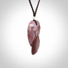 This is a hand carved love heart pendant made from a gorgeous and striking piece of Brecciated jasper stone. This is a superbly carved and very unique piece. For sale online from NZ Pacific.