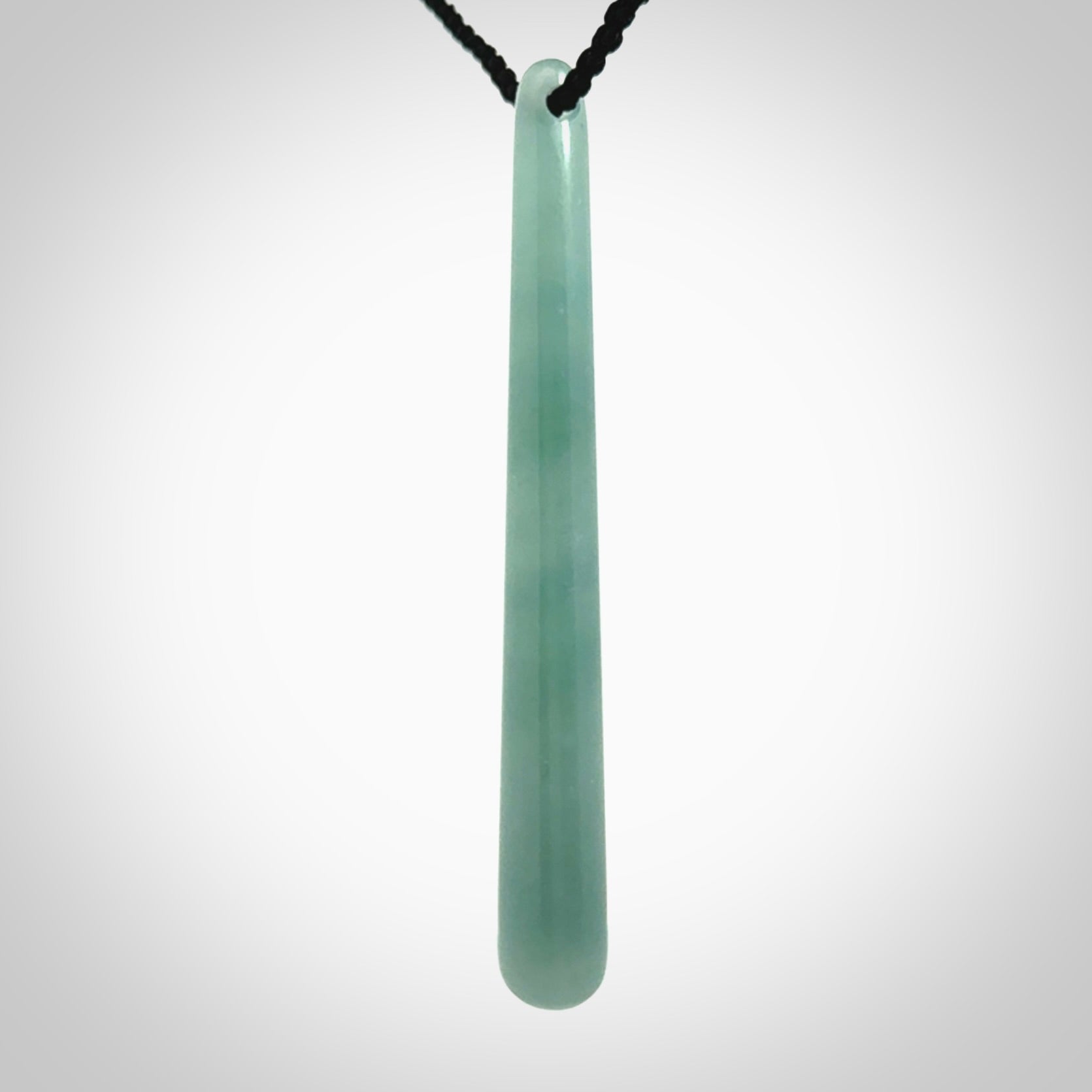 Hand carved large Guatemalan Jadeite drop pendant.